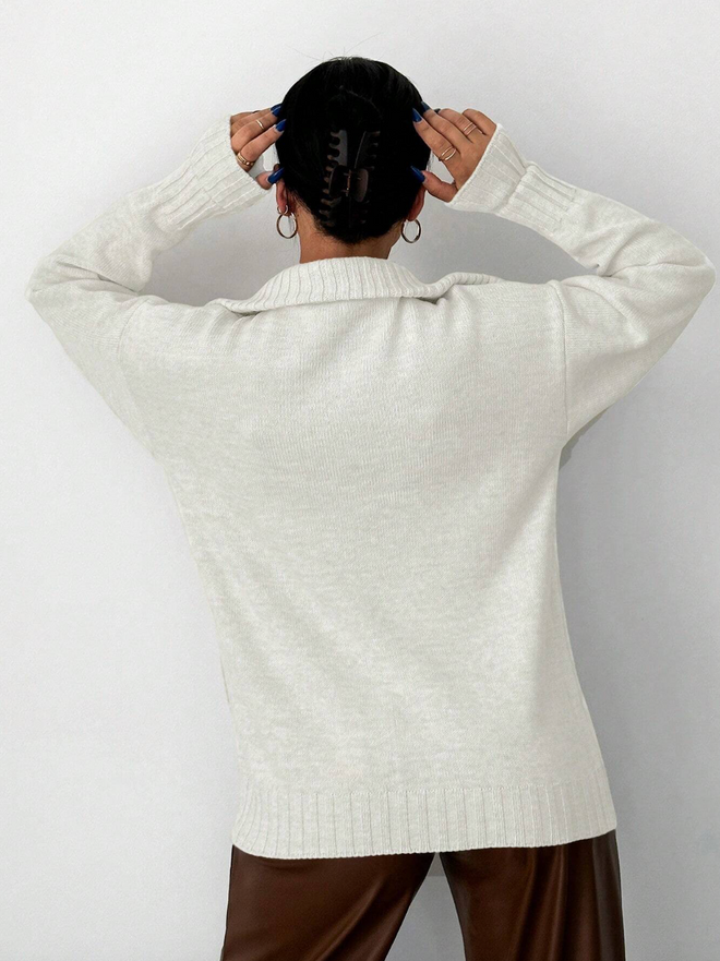 Pull demi- zip au style minimaliste